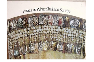 Item #3600 ROBES OF WHITE SHELL AND SUNRISE. Personal Decorative Arts of the Native American. R....